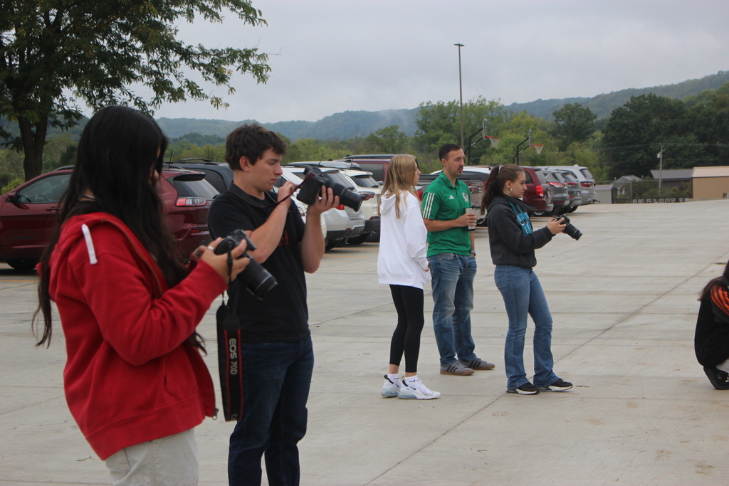 Students taking pictures